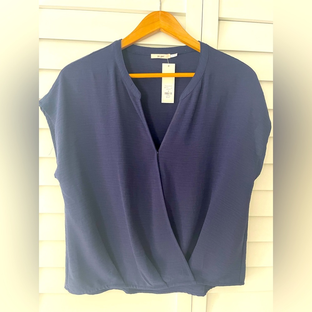 Francesca’s short sleeve pleated top